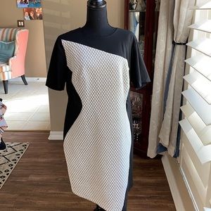 Asymmetrical body con dress